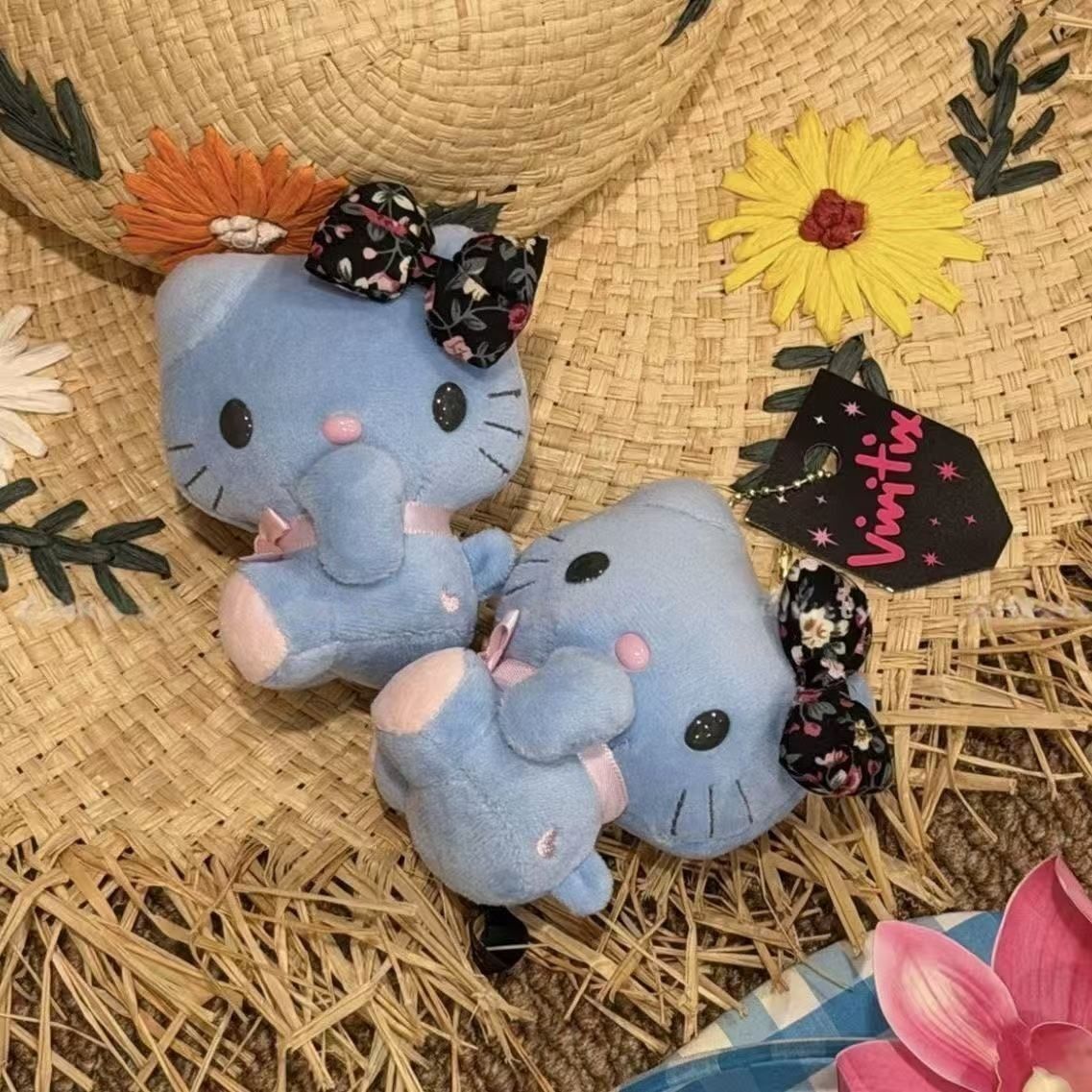 ブルーハローキティ花柄リボン結びサイドシッティングポーズぬい - Good Floral & Wedding Decor Supply Photos のレビューと価格